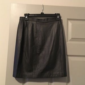 Carol Little mini black leather skirt.